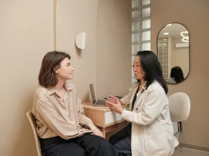 Doctor Speaking with Patient